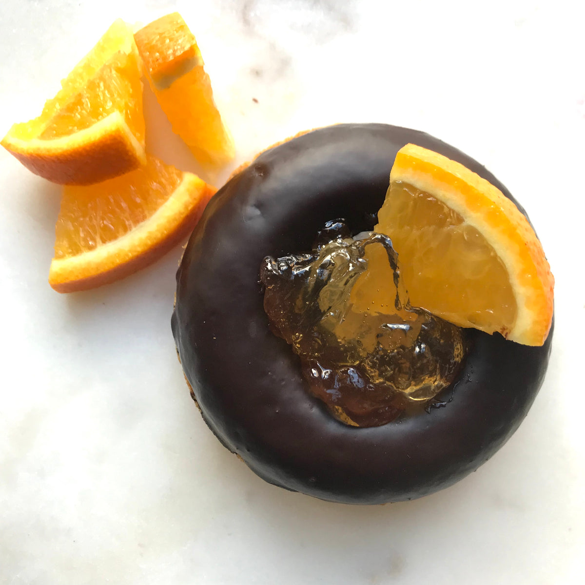 GF and VEGAN JAFFA CAKE DONUT DOZEN The Dorset Donut Co.